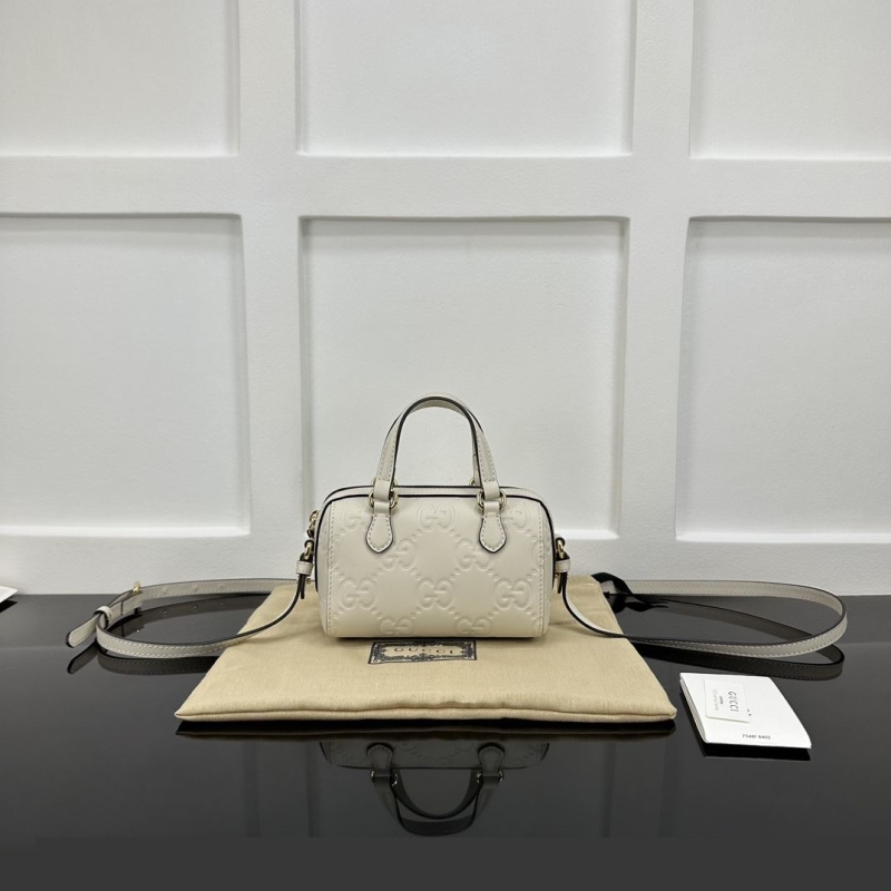 G*u*i speedy bags